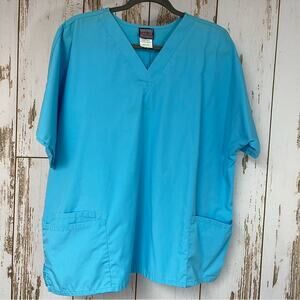 Cherokee, Turquoise Scrub Top. Size XL. In good used condition!